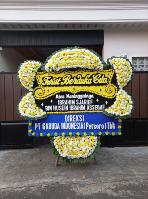 Papan Bunga Duka di Anggilowu